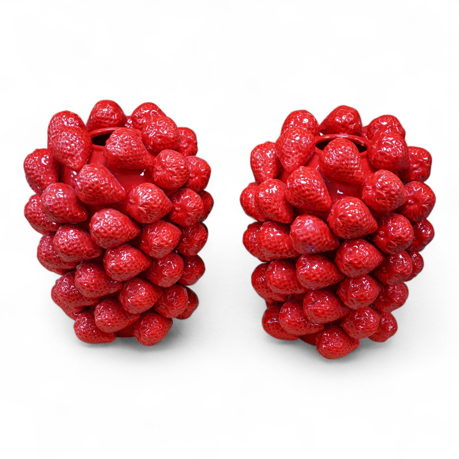 A pair of multi strawberry ceramic vases, 32cm high